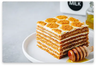 Creamy milk and honey layered cake with smooth frosting