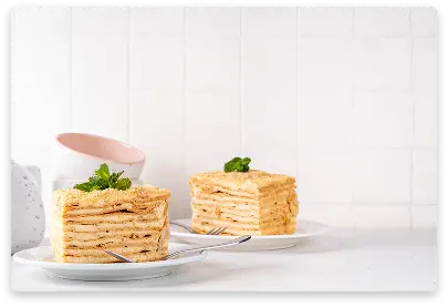 Classic Napoleon cake with many thin layers and cream filling
