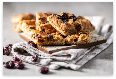 Square puff pastries filled with sweet cereal and grain mixture